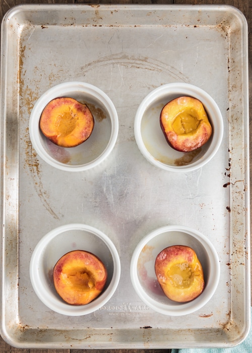 Baking the peaches in ramekins. 