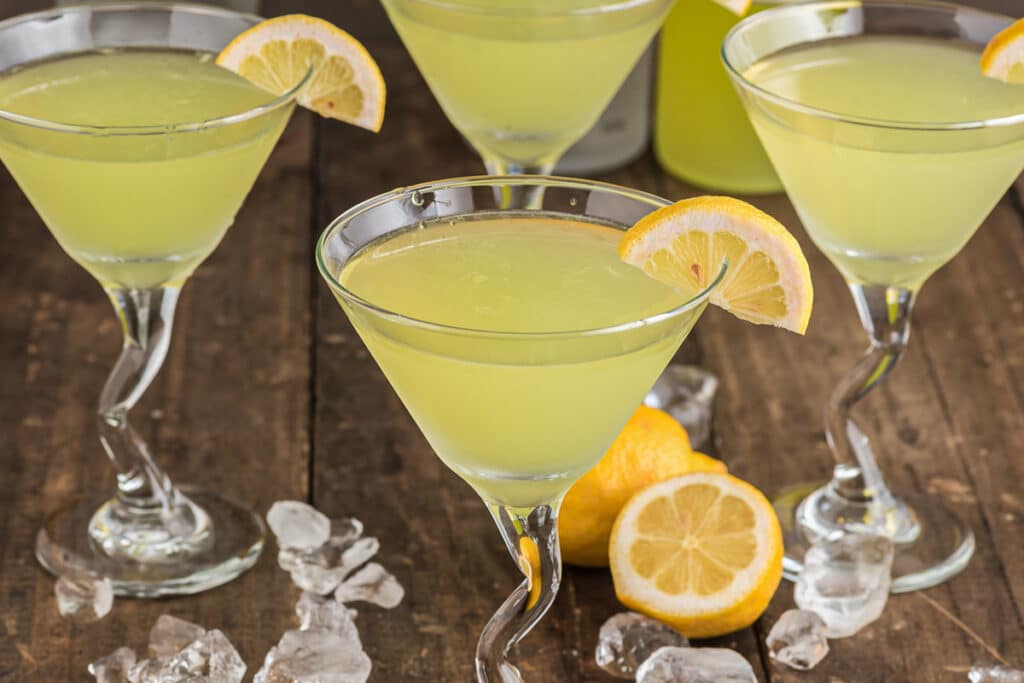 Lemon drop martinis in three glasses.