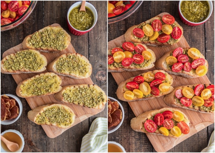Spreading pesto and chopped tomatoes on the bread.