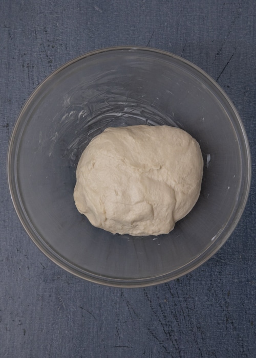The dough in the mixing bowl.