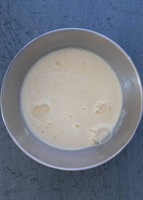 The cream mixture in a silver bowl.