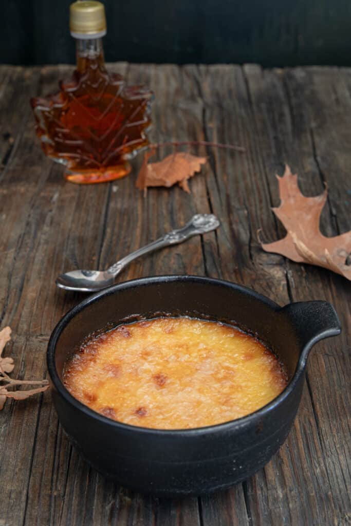 A cooked brulee in the ramekin.