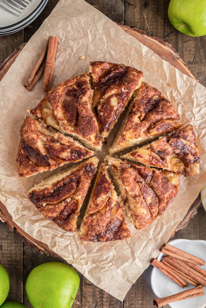 Apple cake on a piece of brown paper.