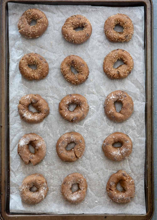 The unbaked cookies on a baking sheet.