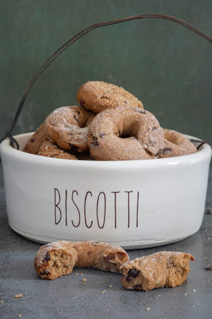 Cookies in the bowl and one broken.