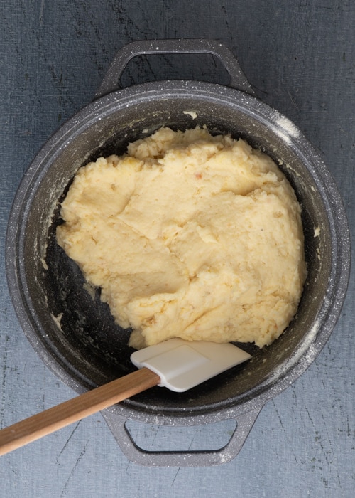 Adding the cheese and egg.