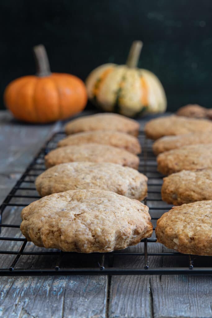 Cookies on a black wire rack.