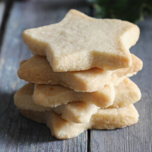 Five brown sugar shortbread cookies stacked.