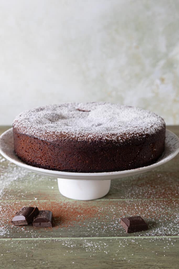Cake on a white cake plate.