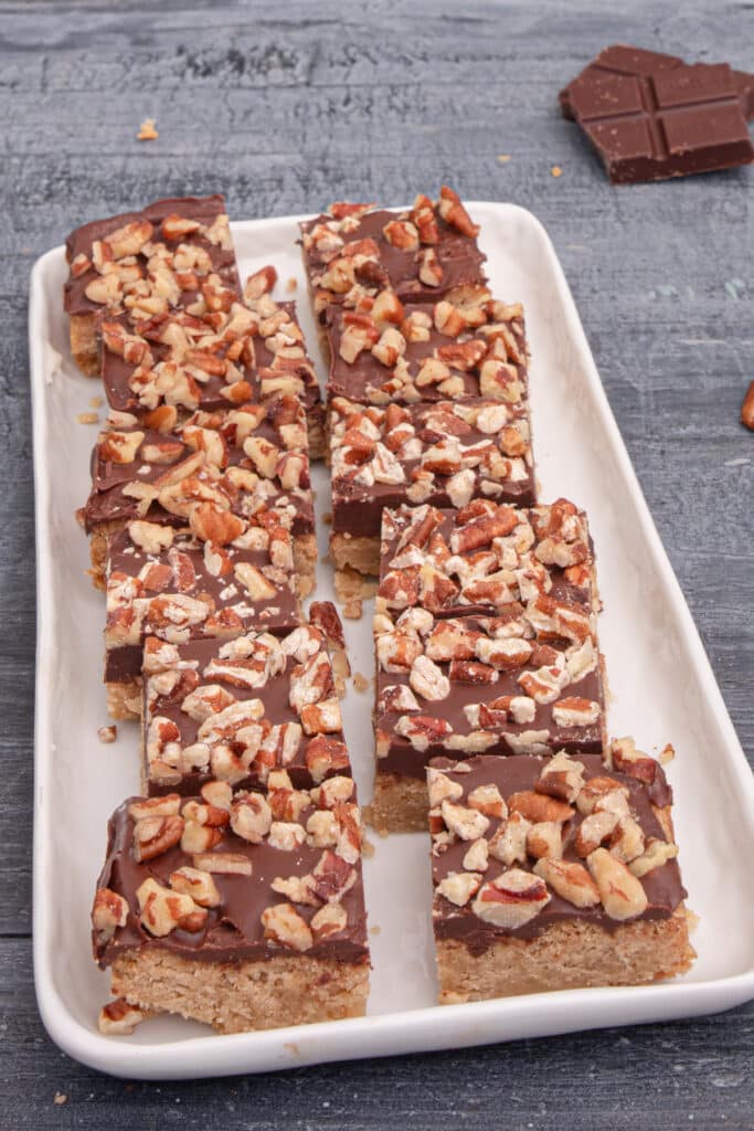 Shortbread bars on a white plate.