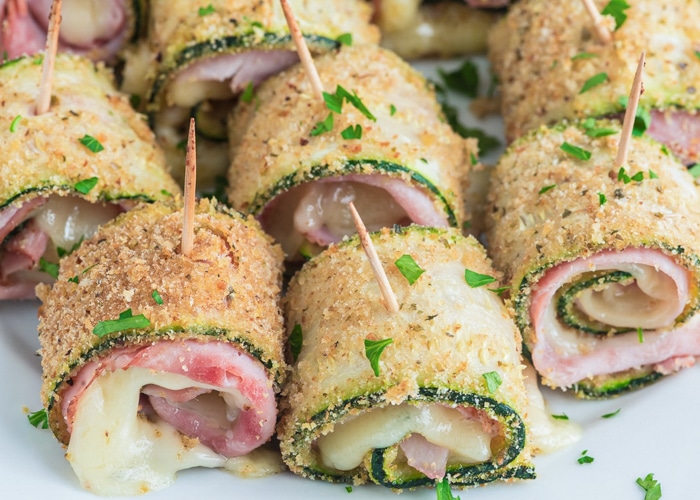 Zucchini rollups on a plate.