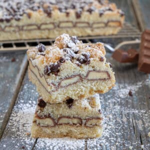 Kinder bar on a wire rack and two stacked.
