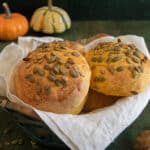 The pumpkin buns in a basket.
