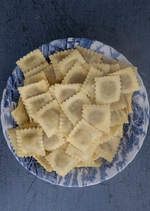 The cooked ravioli in a bowl.