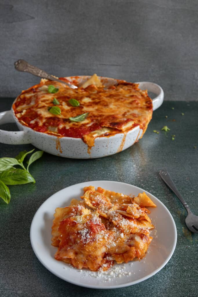 Pasta in the pan and some on a plate.