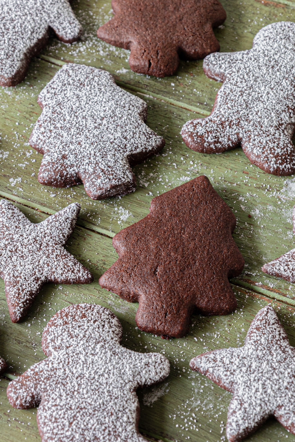 Chocolate sugar cookies on a board.