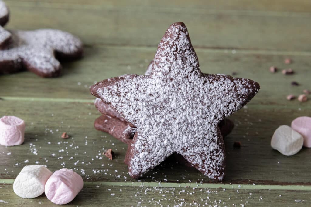Two cookies stacked and a star against it.