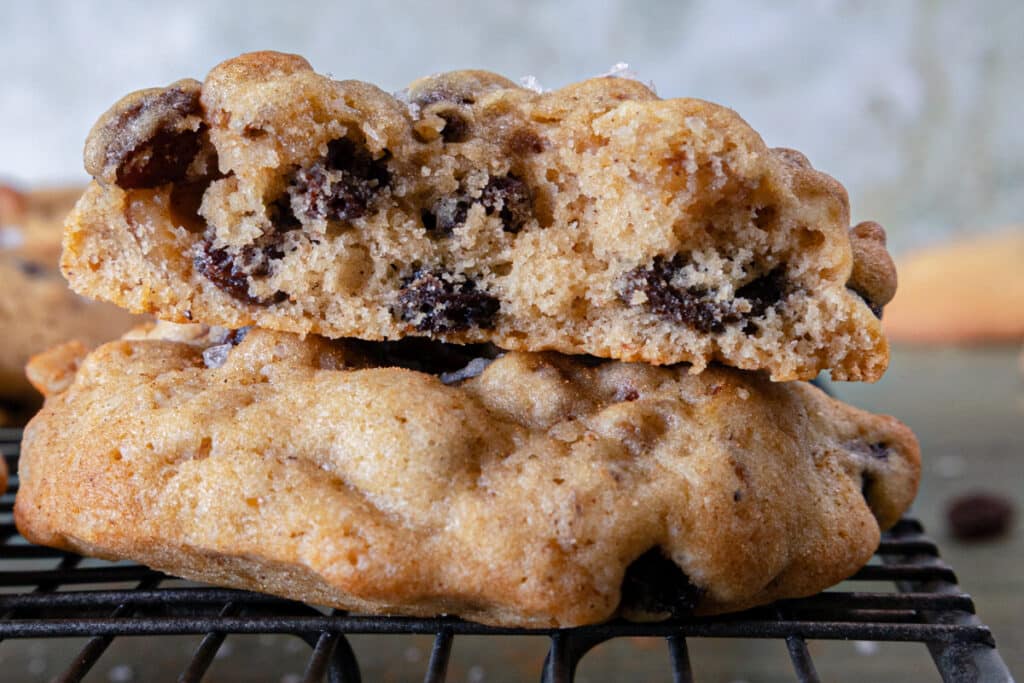 Two hermit cookies with one cut in half.