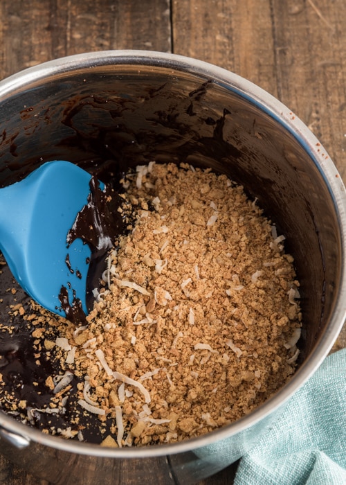 Adding the crumbs and coconut.