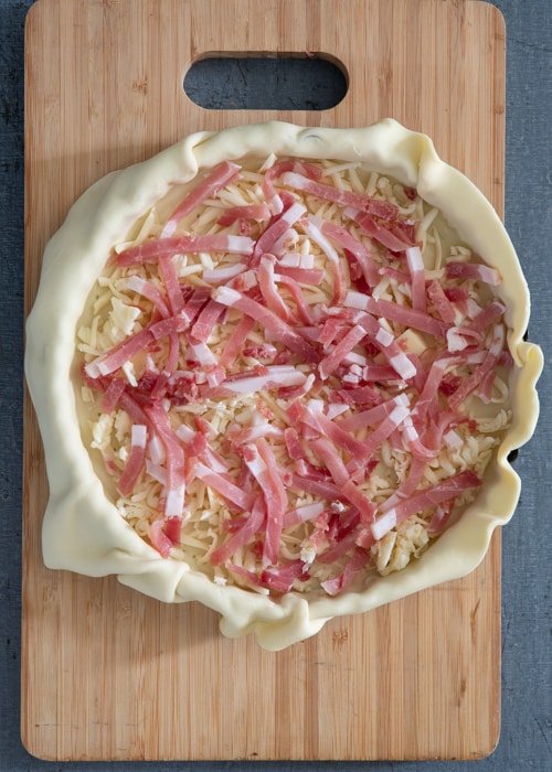 The cheese and pancetta on the crust.