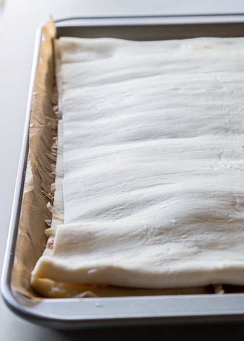 The pastry on top and ready to be chilled.