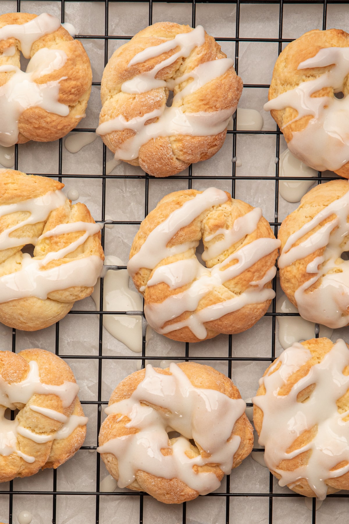 Glazed cookies on a wire rack.