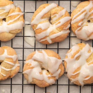 Glazed cookies on a wire rack.