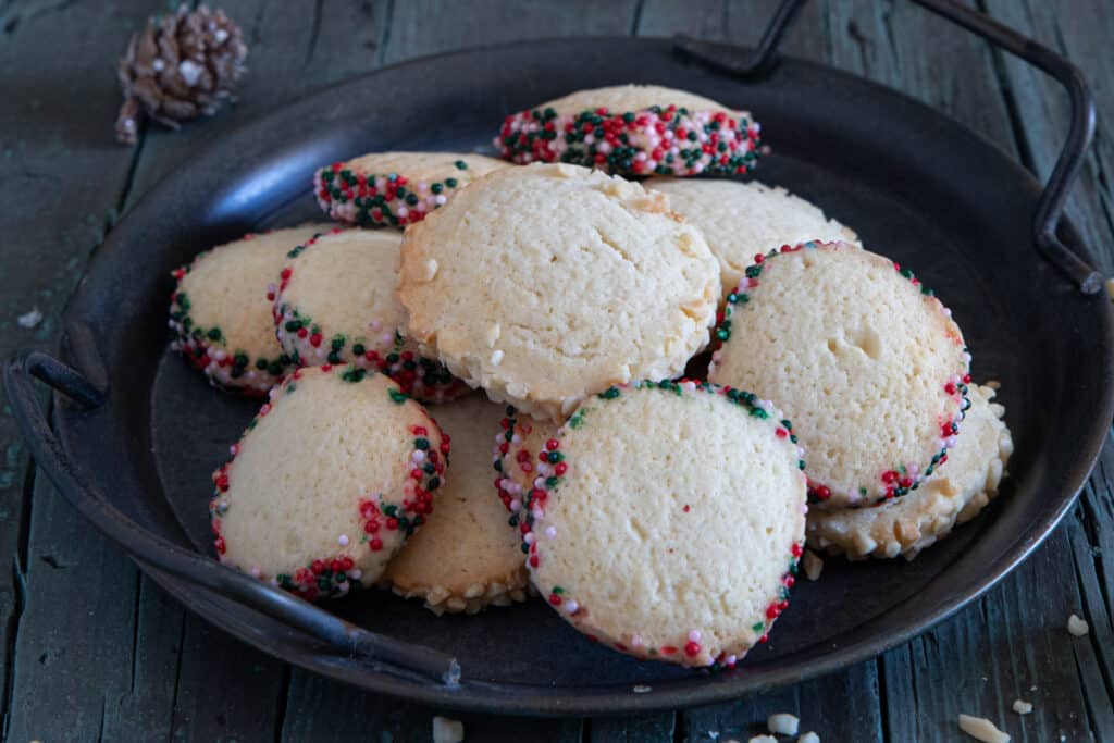 Yogurt cookies on a black plate.