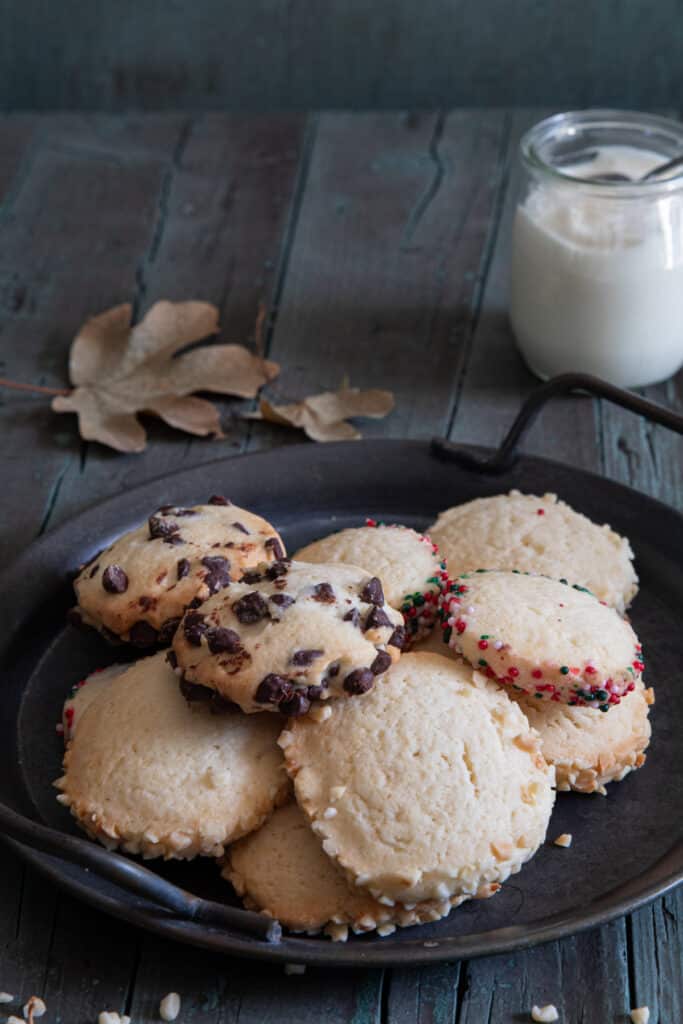 Yogurt cookies on a black plate.