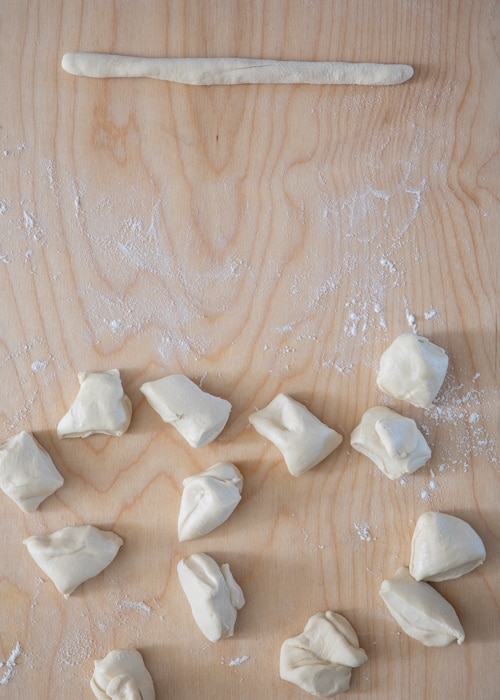 Dividing the dough and rolling into a log.