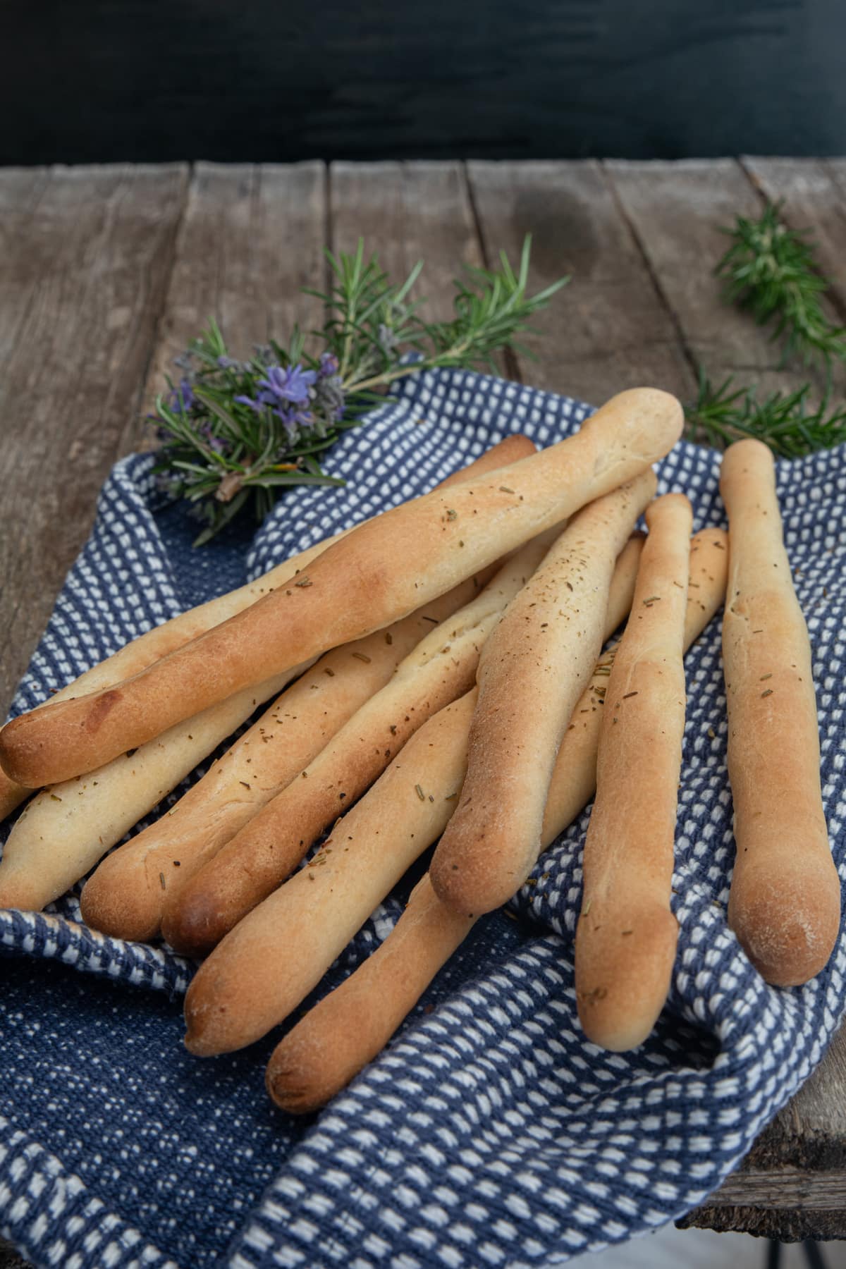Grissini on a blue napkin.