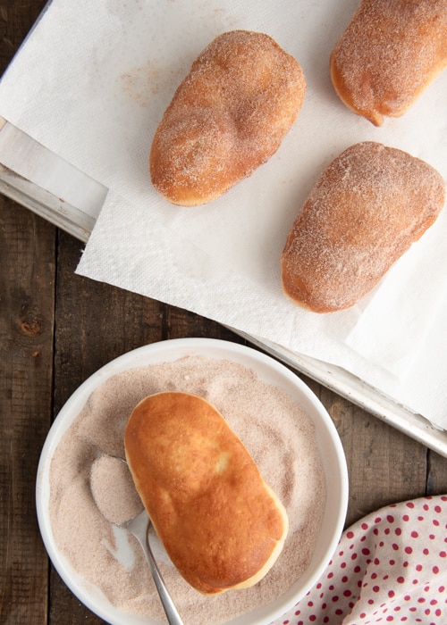 The beavertails fried and rolled in cinnamon sugar.