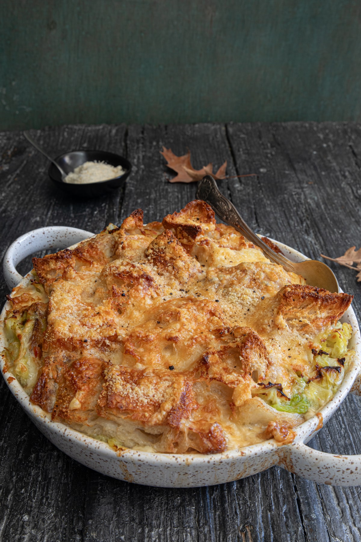 Cabbage soup in the white dish.