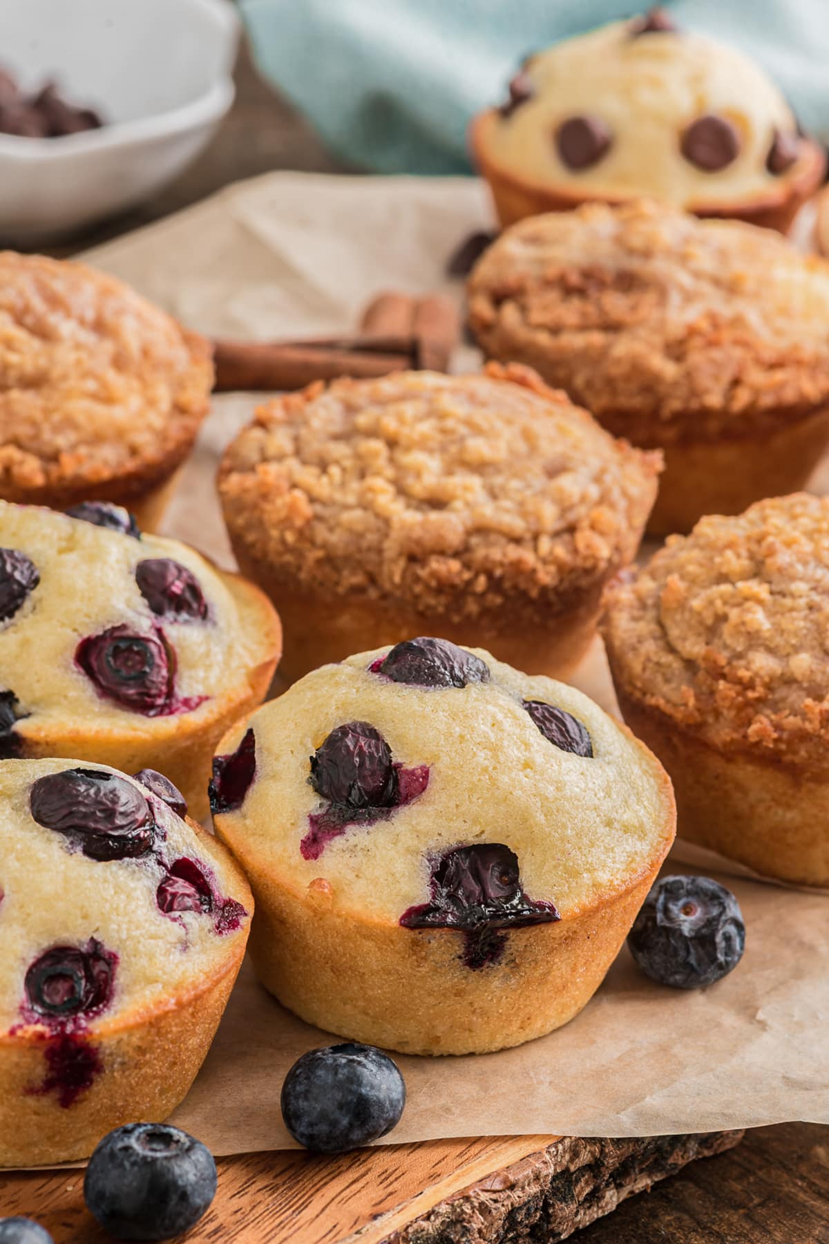 Muffins on a piece of brown paper.