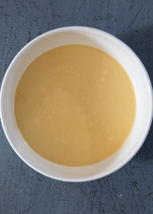 The batter in the white bowl.