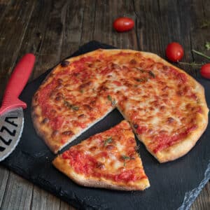 The pizza scrocchiarella on a black board.