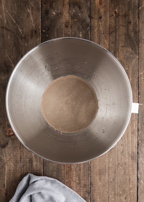 The yeast in the bowl with the water.