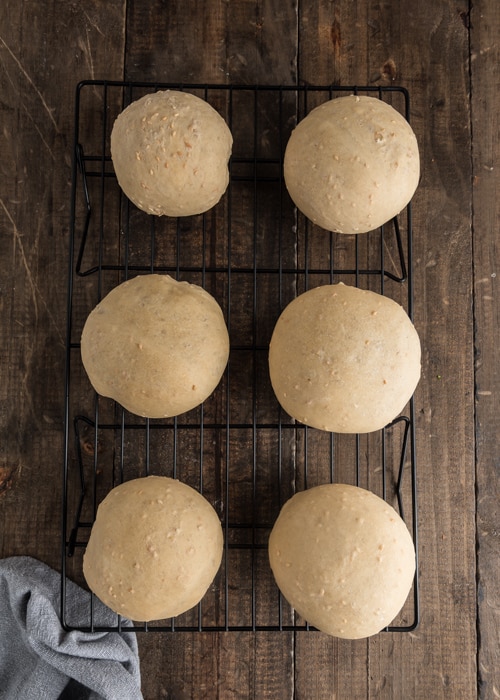 The buns after baked on a wire rack.