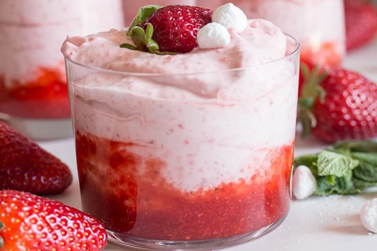 Strawberry mousse in three glasses.