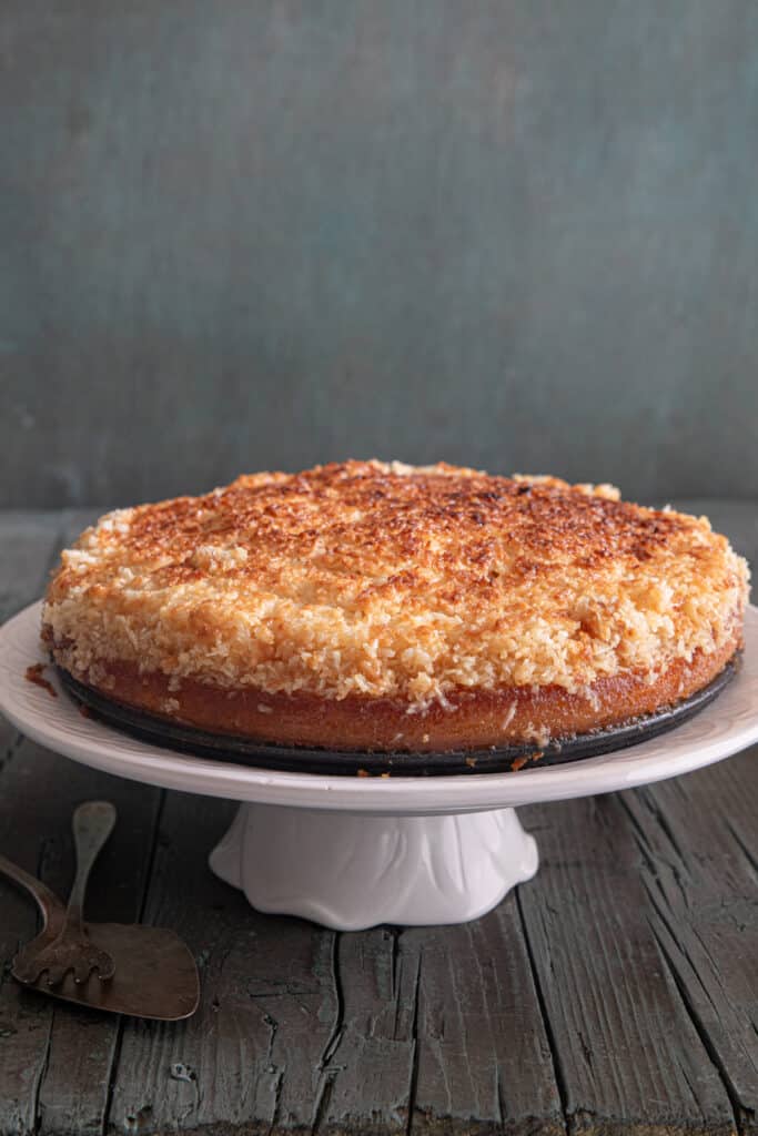 The  cake on a white cake pan.