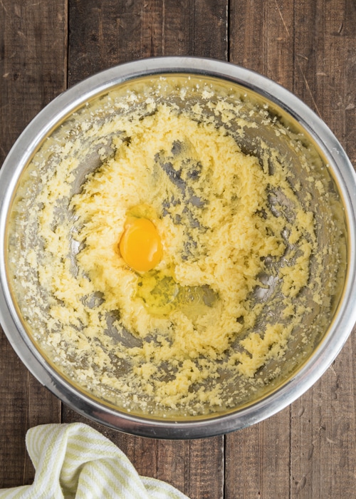 Beating the wet ingredients and adding the egg.