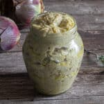Artichoke pesto in a glass jar.