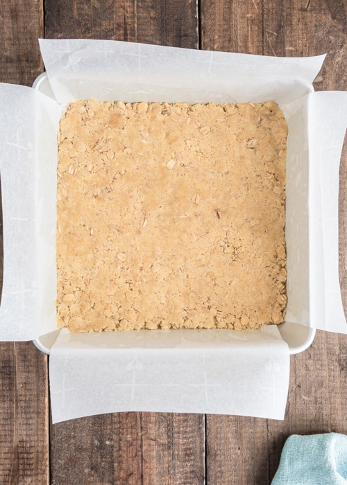 The crumbs in the pan.