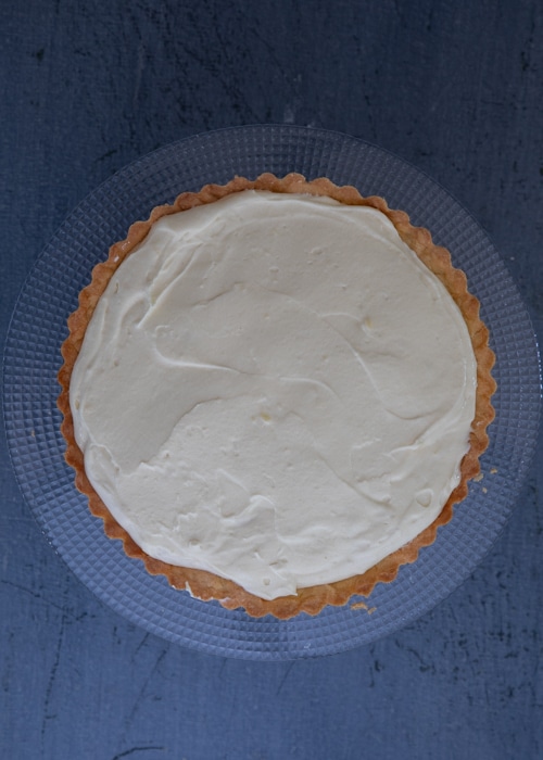 The chantilly cream in the baked crust.