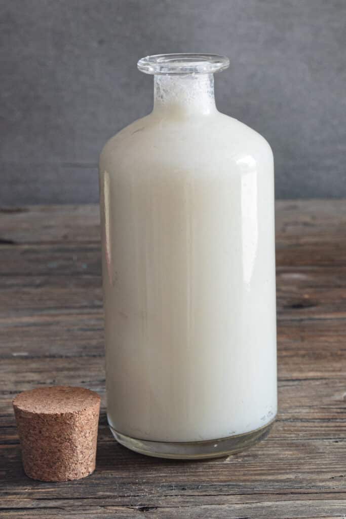 The buttermilk in a jar.