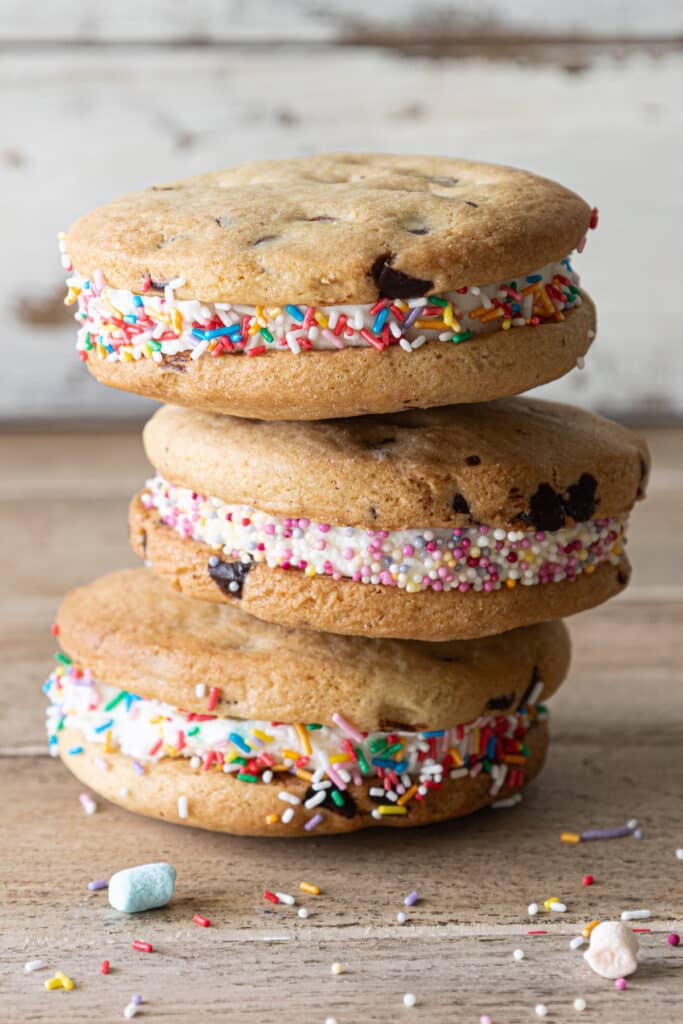 Three ice cream sandwich cookies stacked.