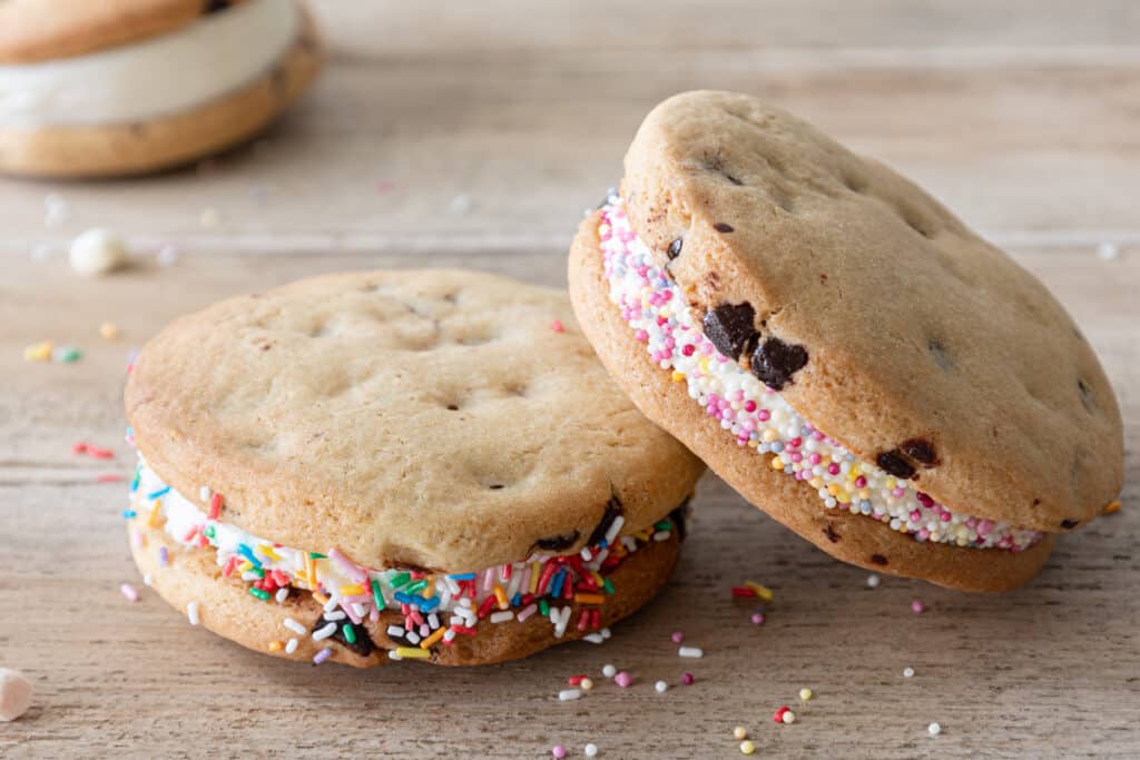Two sandwich cookies stacked.