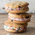 Three ice cream sandwich cookies stacked.