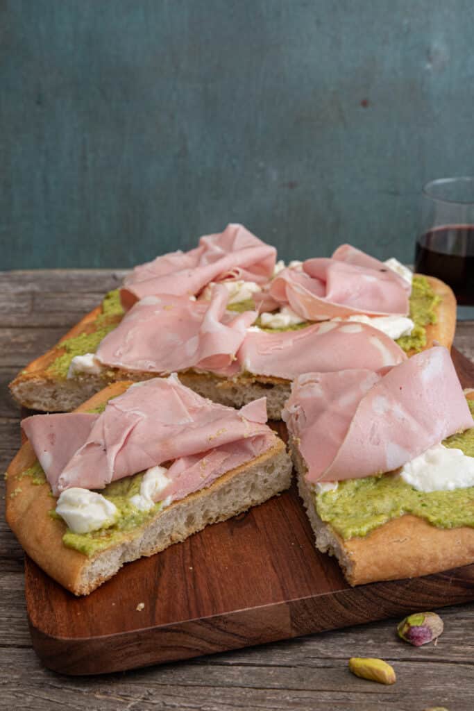 Schiacciata with a piece cut.