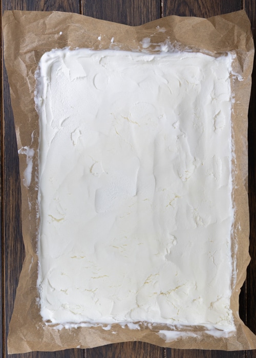 The ice cream on a baking sheet.